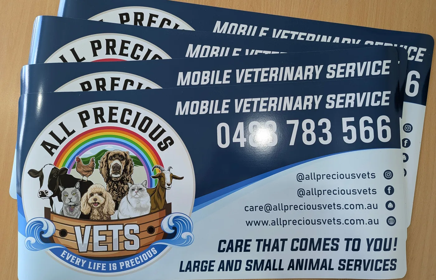 Stack of magnetic vehicle signs for All Precious Vets