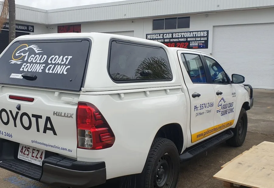Gold Coast Equine Clinic Toyota Hilux ute with professional business signage